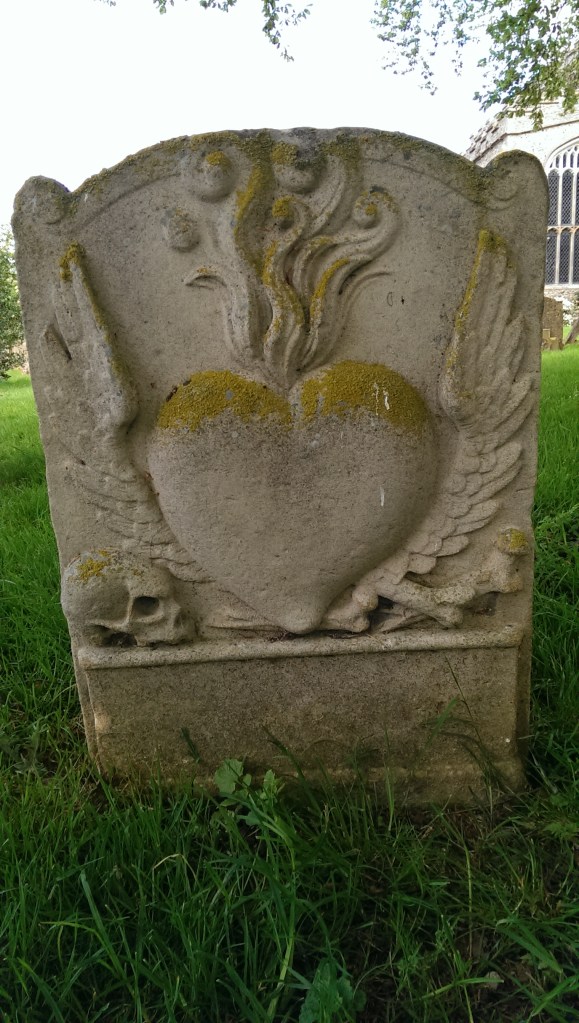 The front of the gravestone to the victims of the fire, in Burwell, Cambridgeshire.